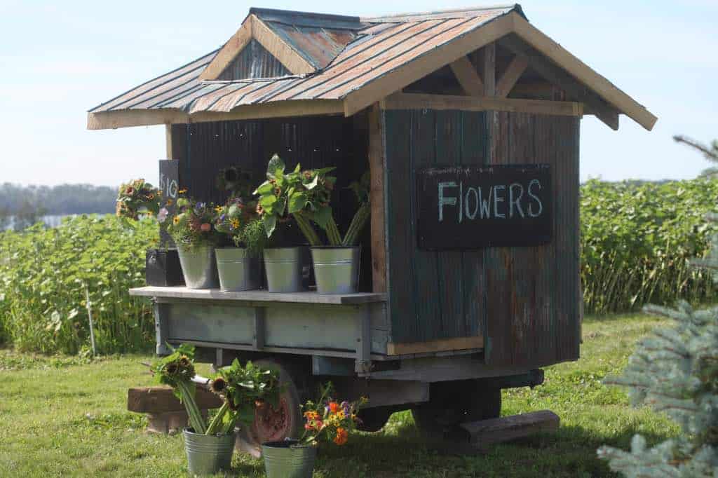 a rustic flower stand